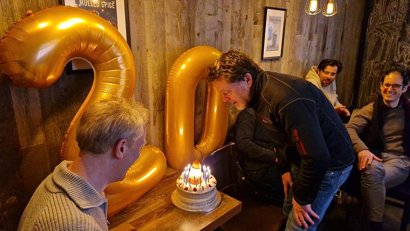 andrew and richard blowing candles
