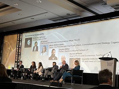 Photo of the Environmental Sustainability Panel on stage