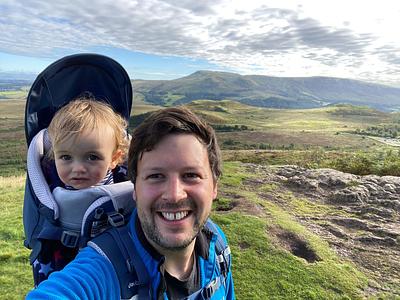 Chris hill walking with his son